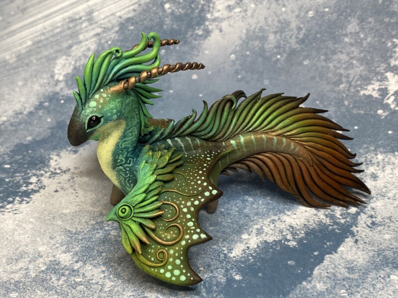 Fox, hybrid dragon, tiny jackalope, wolf with raven and fennec